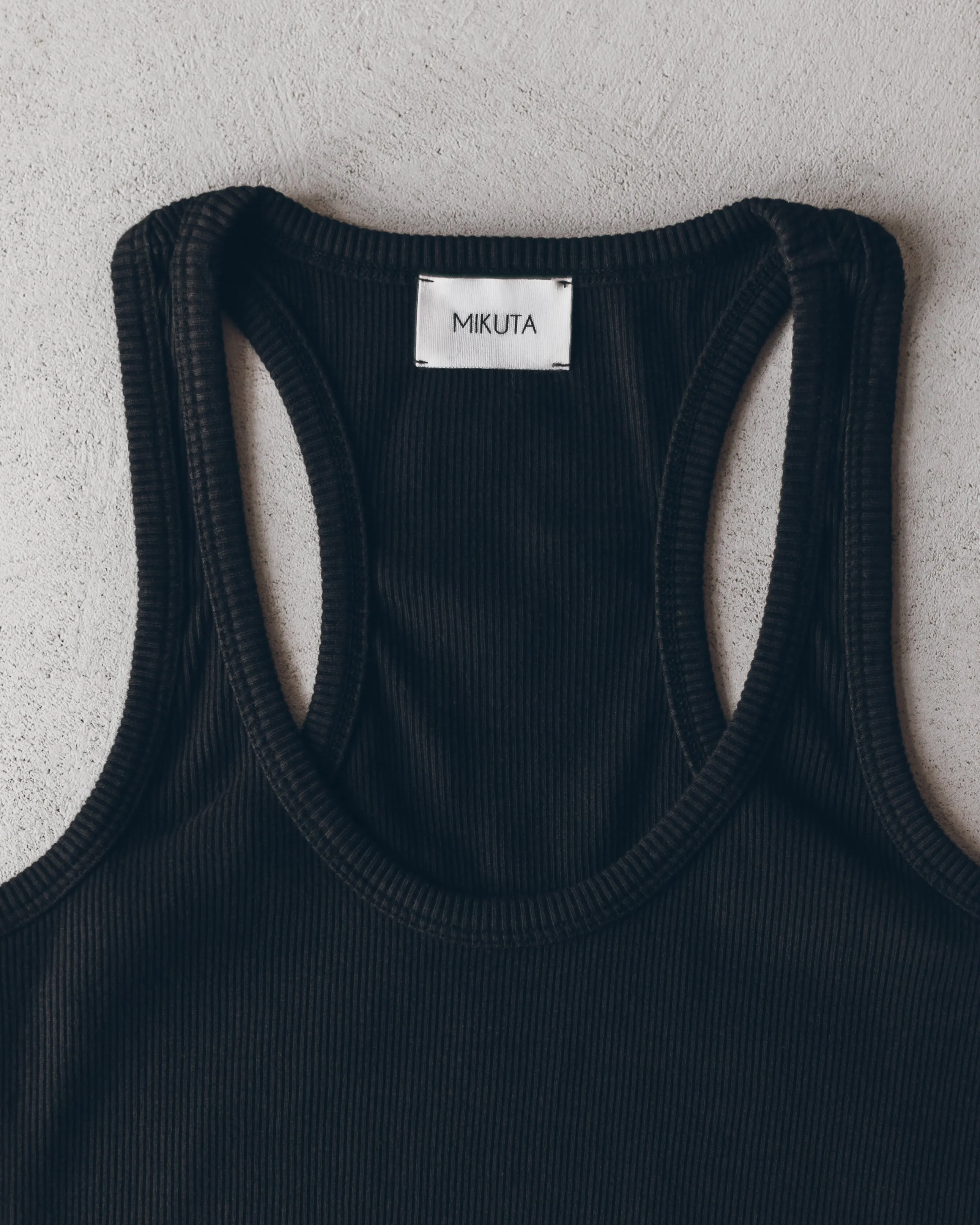 The Black Ribbed Tank Top